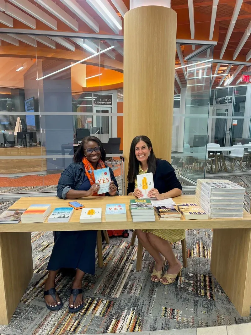 Women in Leadership Cohort Experience leaders Candace Campbell Jackson and Dara Royer share books from the WiL Summer Reading List at Syracuse University.