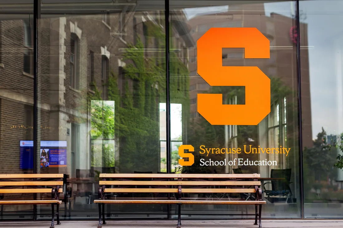 Outside window with logo for School of Education