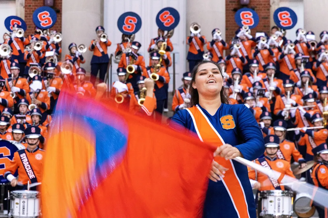 Syracuse University's marching band and majorettes.