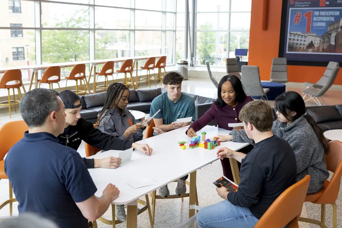 Students sitting at a table.
