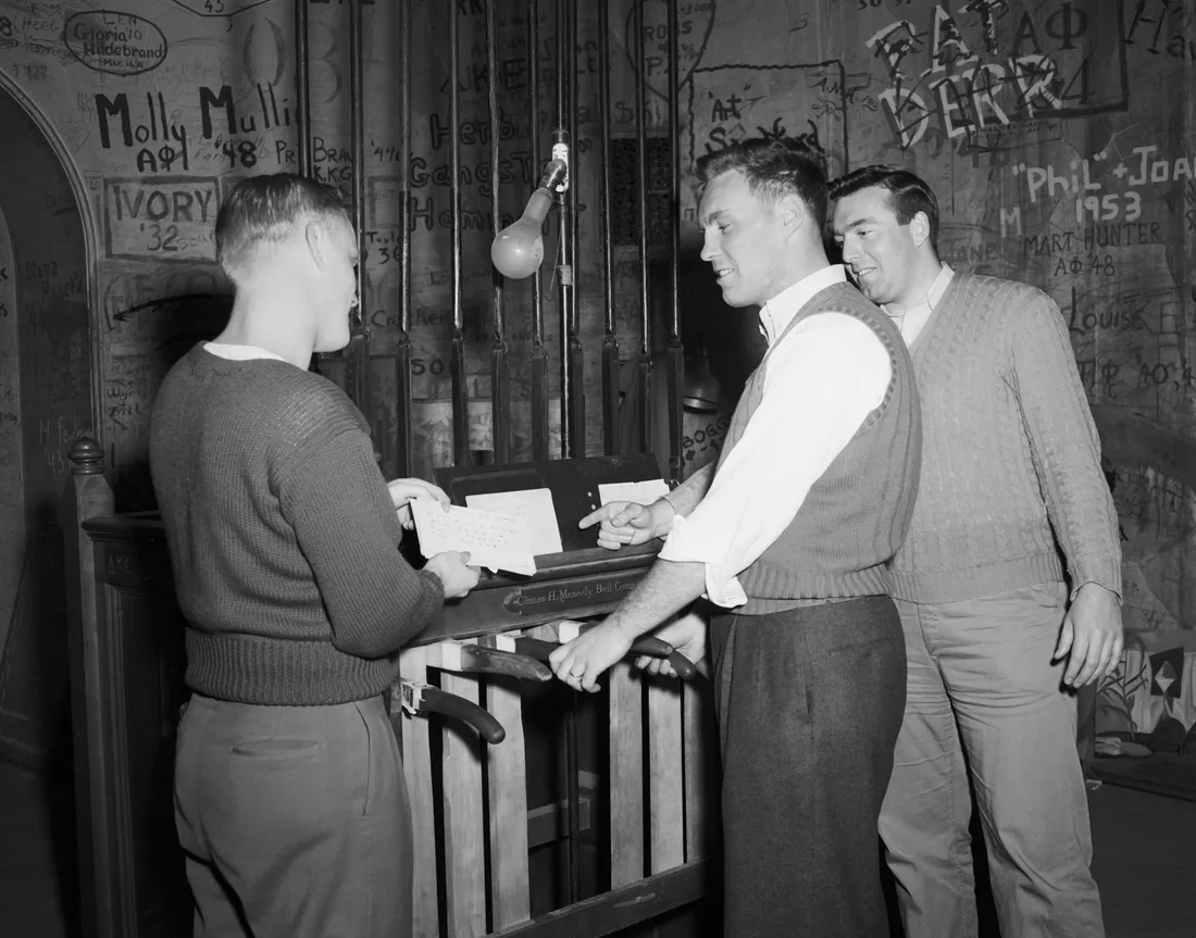 Vintage photo of students playing bells.