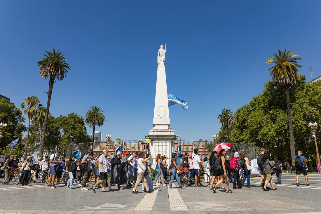 People walking through the town of Buenos Aires, Argentina.