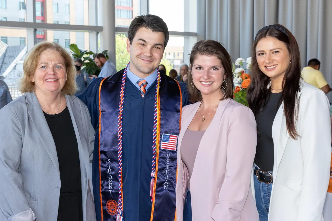 Veteran at graduation with family.