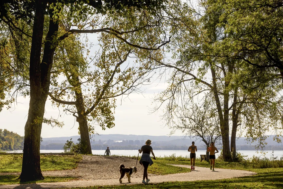 People walking in Onondaga Lake Park.