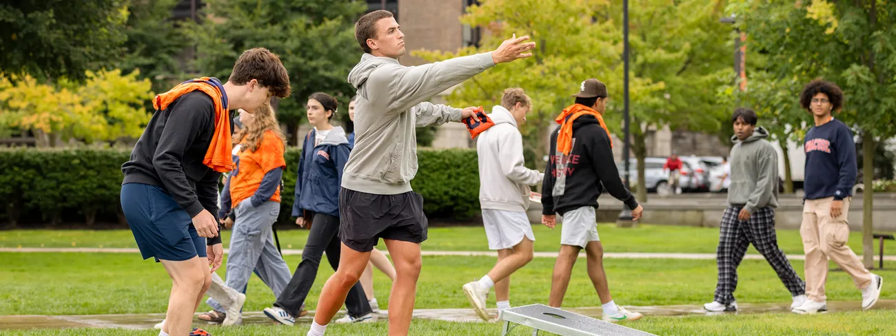 Members of Living Learning Communities gather to celebrate at the LLC Welcome Picnic on the Quad.
