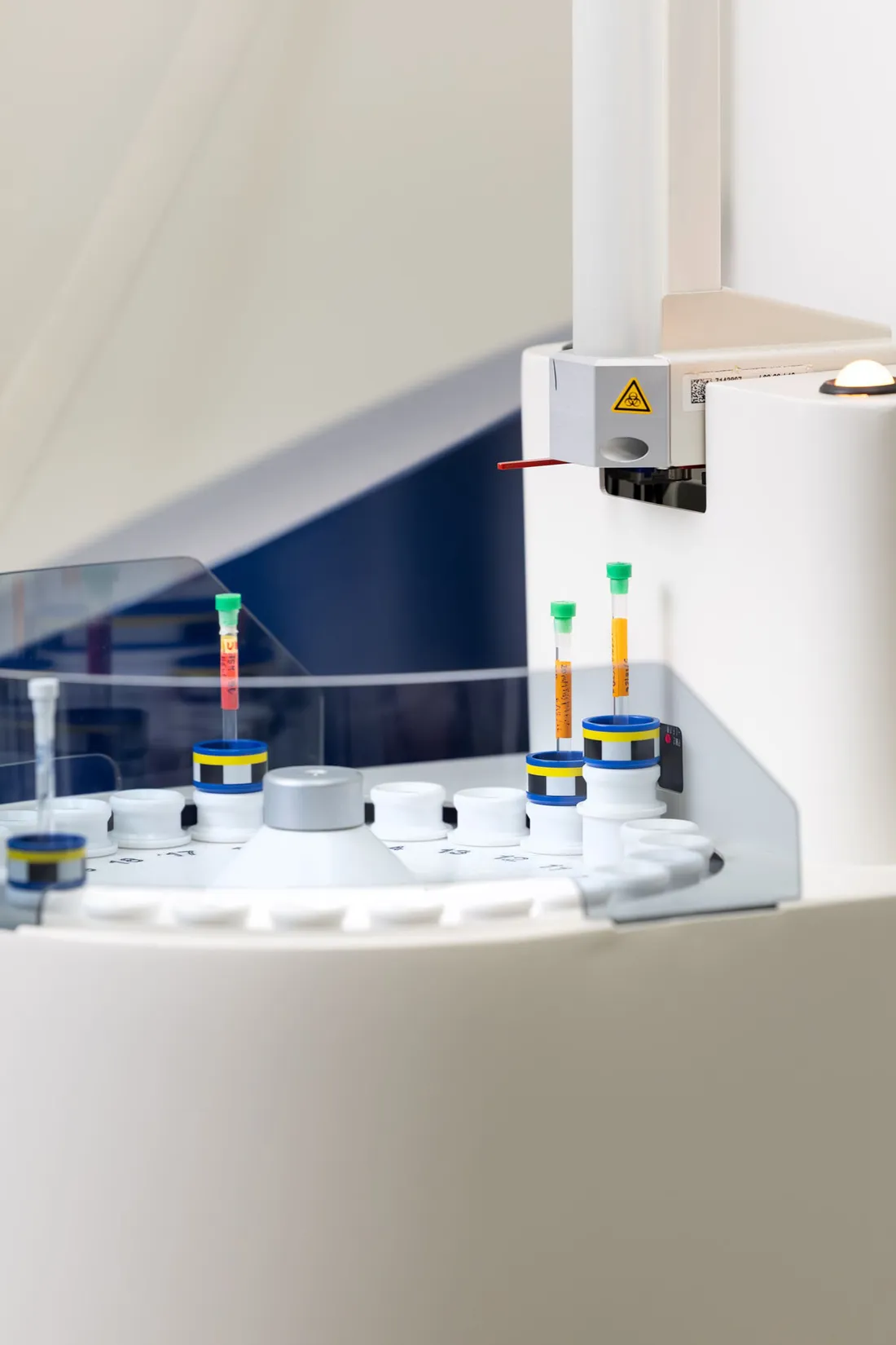 A white tray inside of a magnetic spectrometer in a lab.