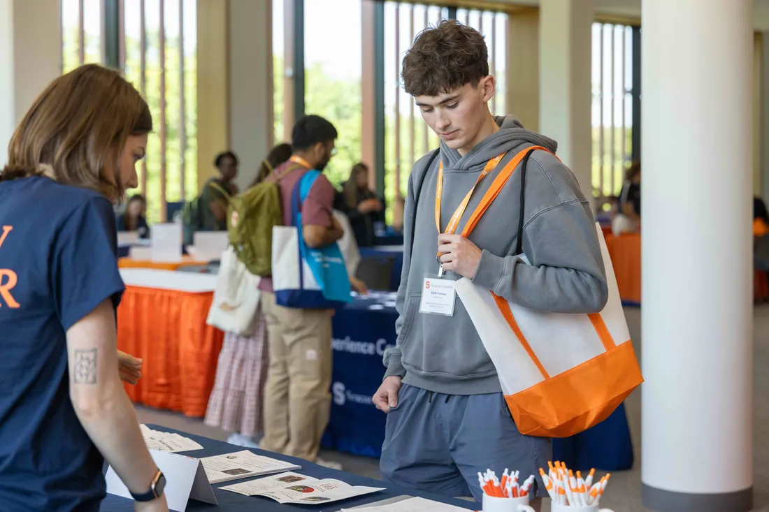 Transfer students signing in at orientation.