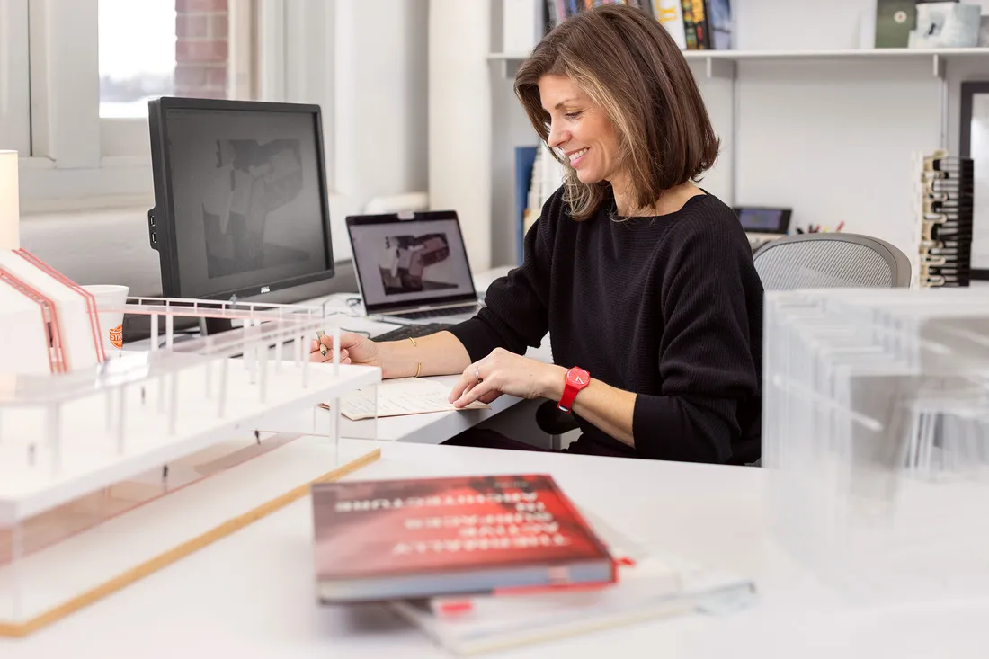 Bess Krietemeyer on a computer.