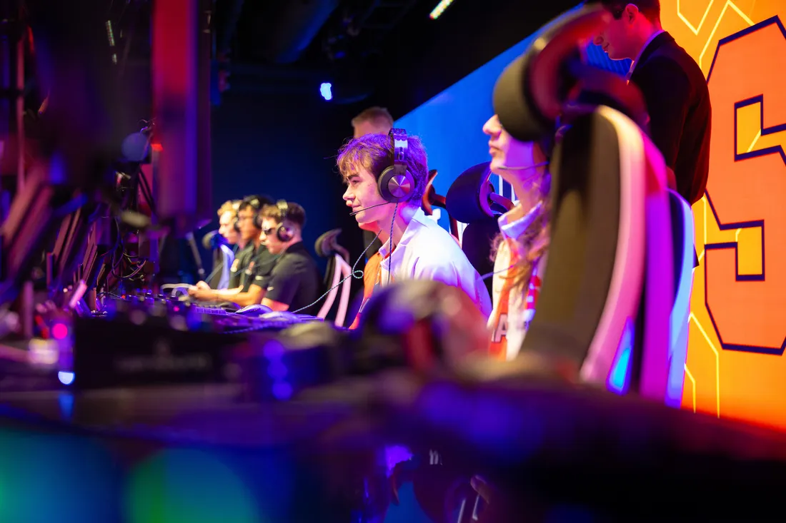 Students in the eSports room playing games.