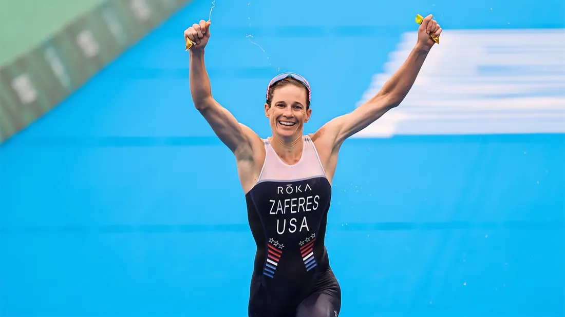 Katie Zaferes with her hands up.