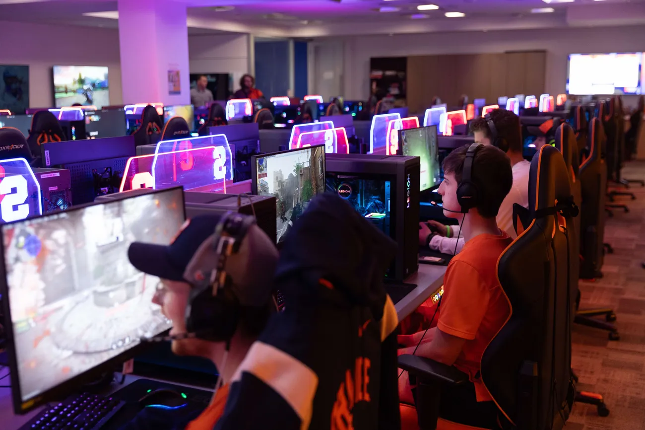 Students in Esports room in row of gaming.