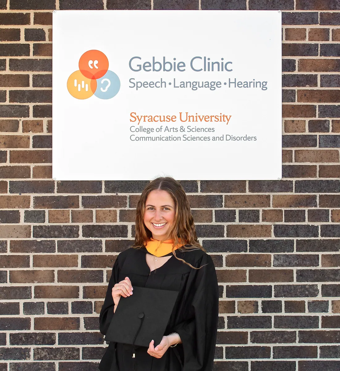 Portrait of Jaclyn Bedder in graduation cap and gown