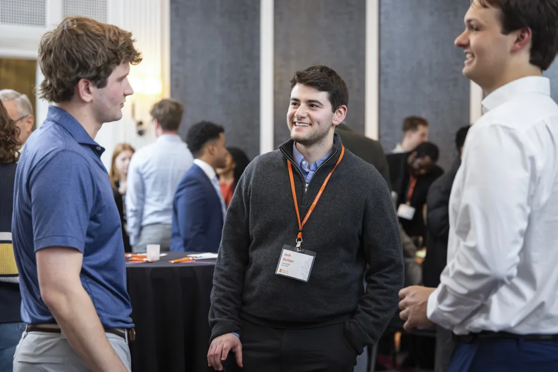 Students participating in the Boston immersion program networking with alumni and career professionals.