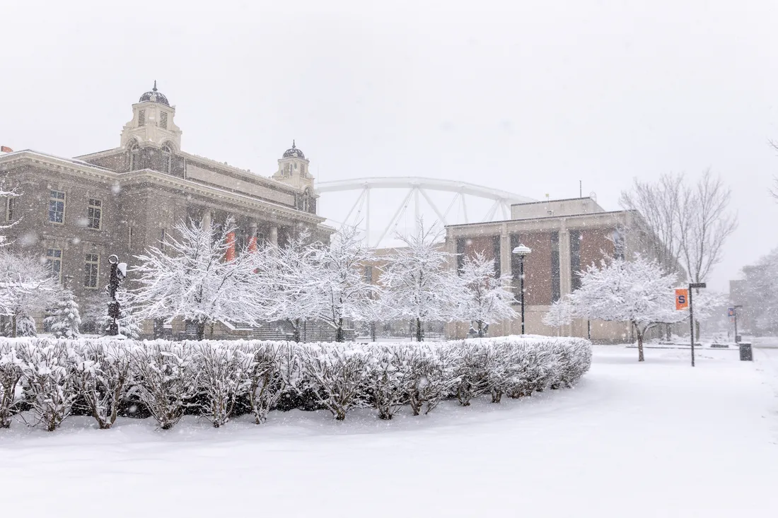 Snow across a college campus.