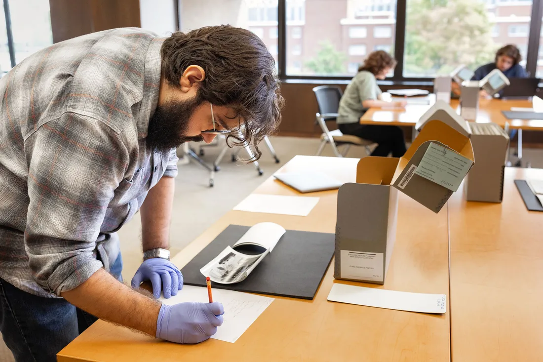 People working in a classroom.