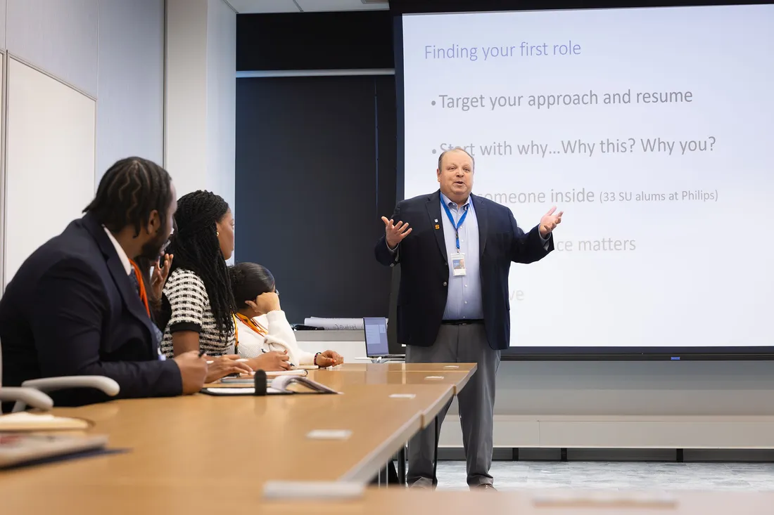 Ken Peters talking to students at Philips HQ.