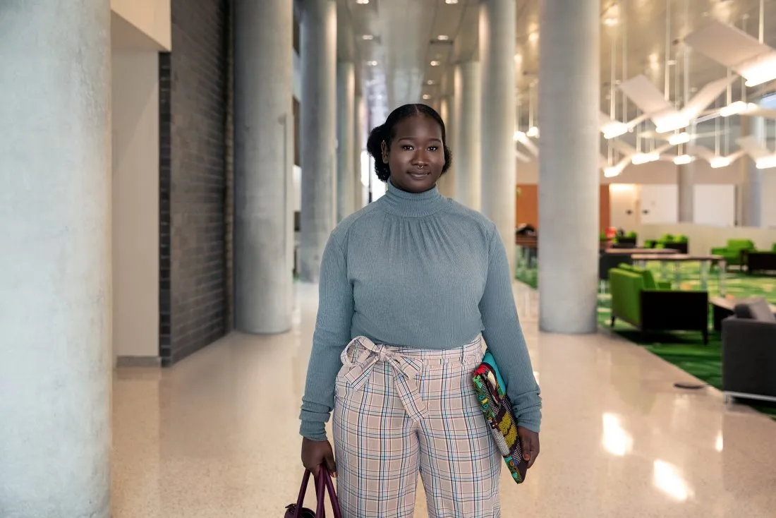 Law student Mazaher Kaila walks through Dineen Hall.