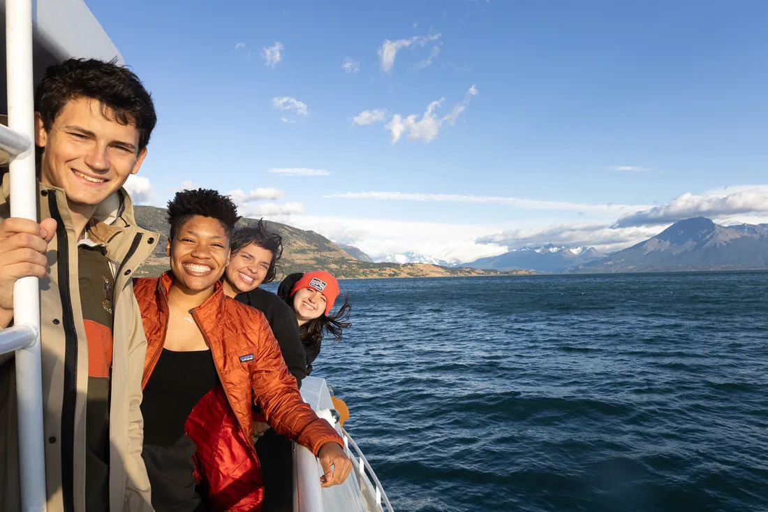 People on a boat in the Patagonia fjords.