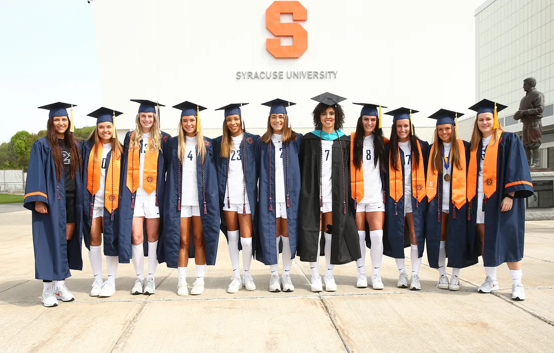 A group of students in cap and gowns.