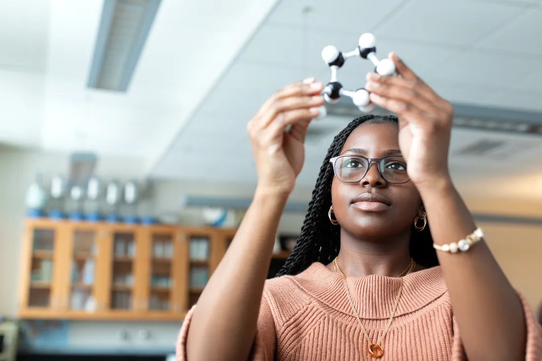 Student working in science classroom.