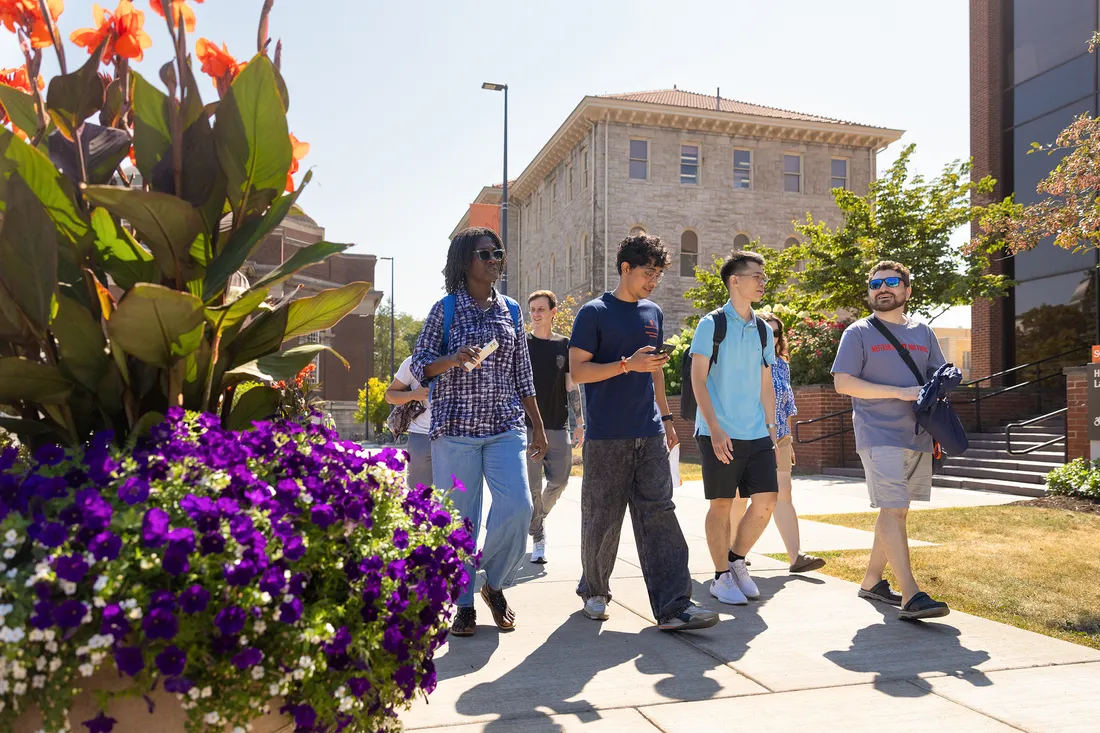 People walking on campus.
