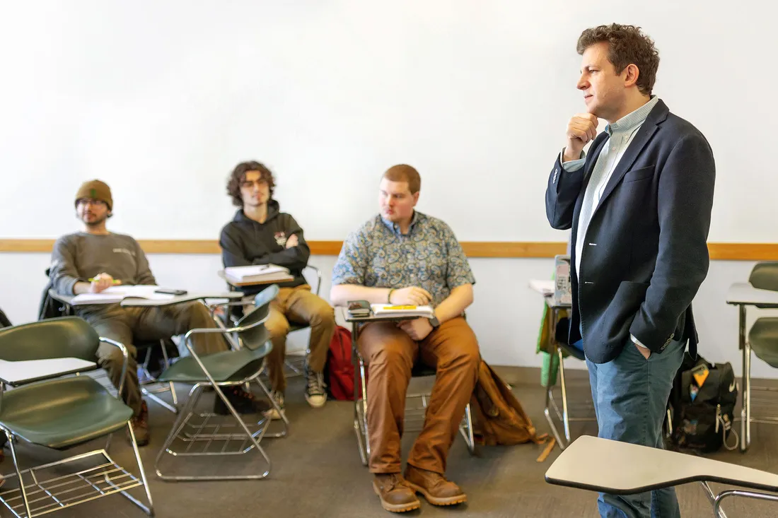 Professor teaching in his class.