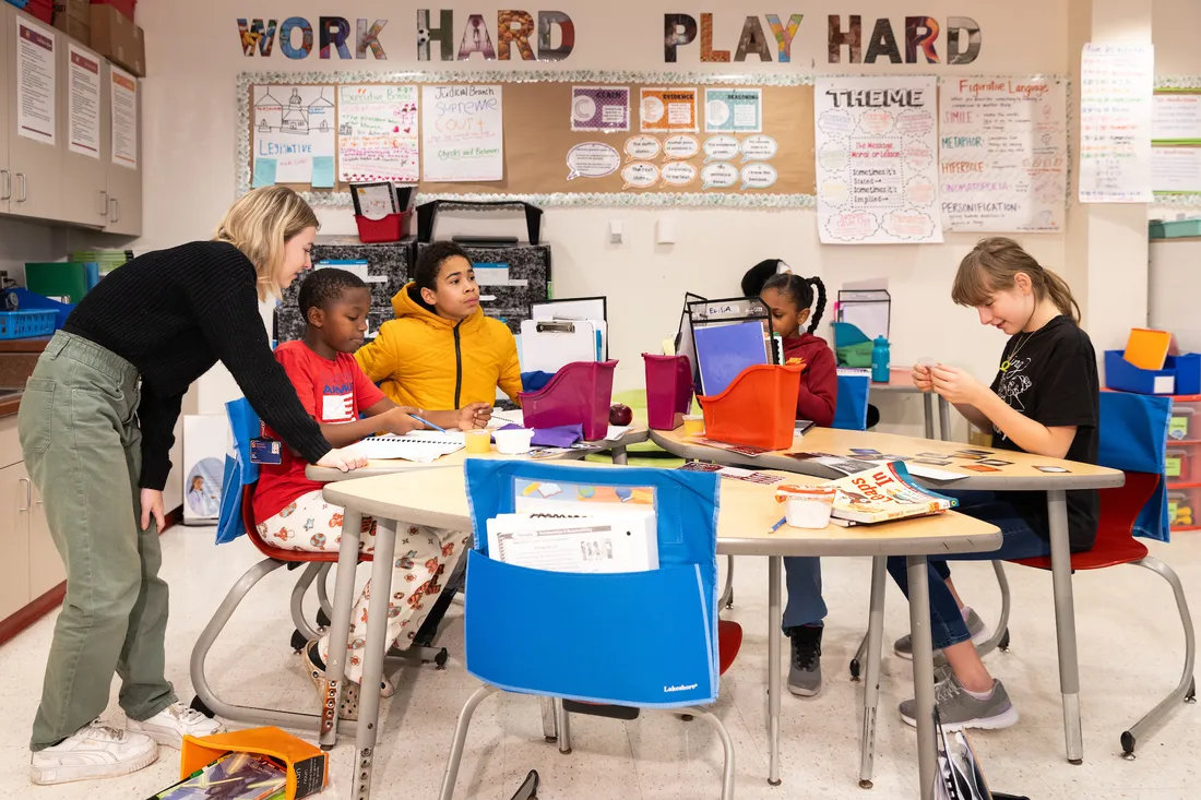 Student working with a local elementary school class.