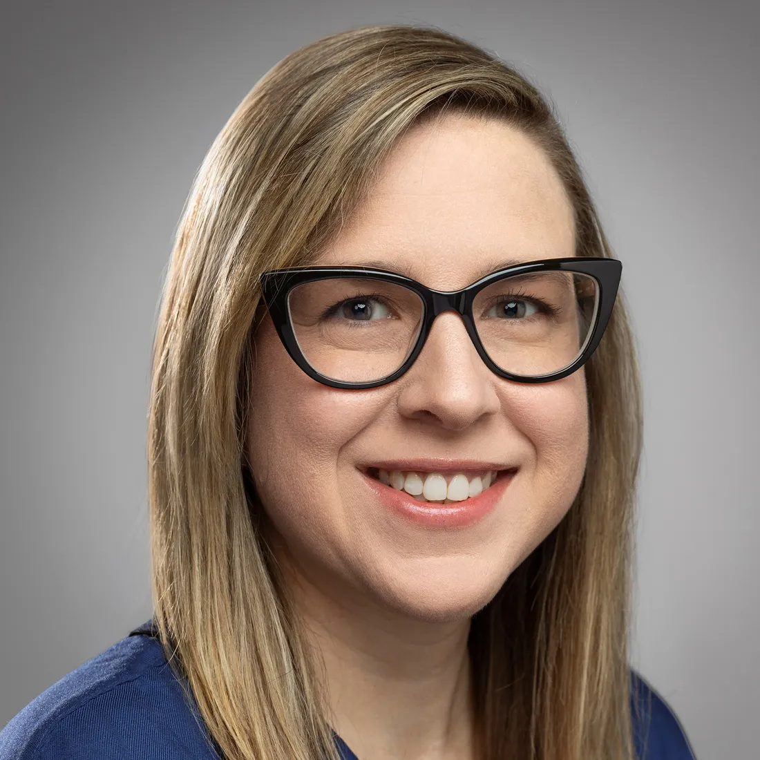 Alix Ferrer Yulfo smiling.