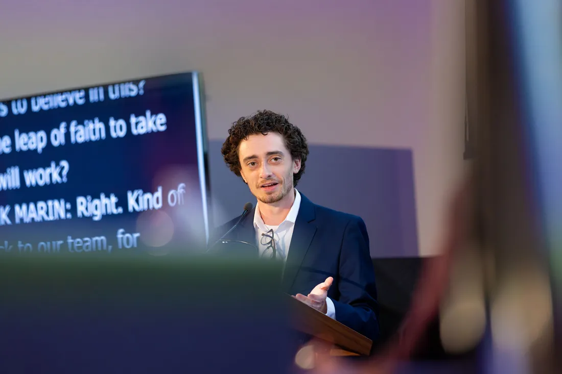 Person giving a presentation.