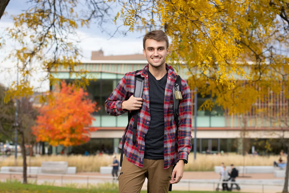 A person standing on campus.