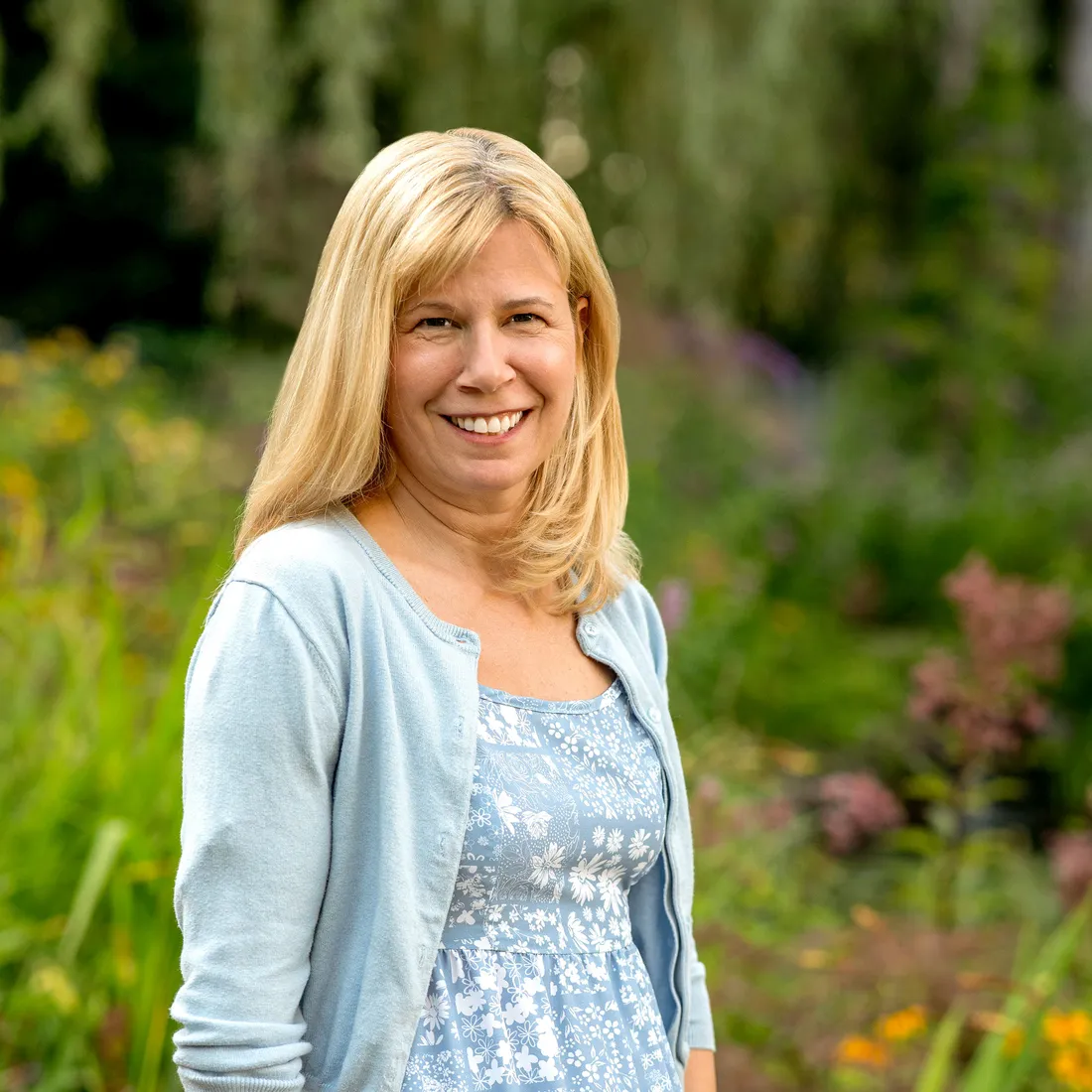 Jill Leary posing outdoors.