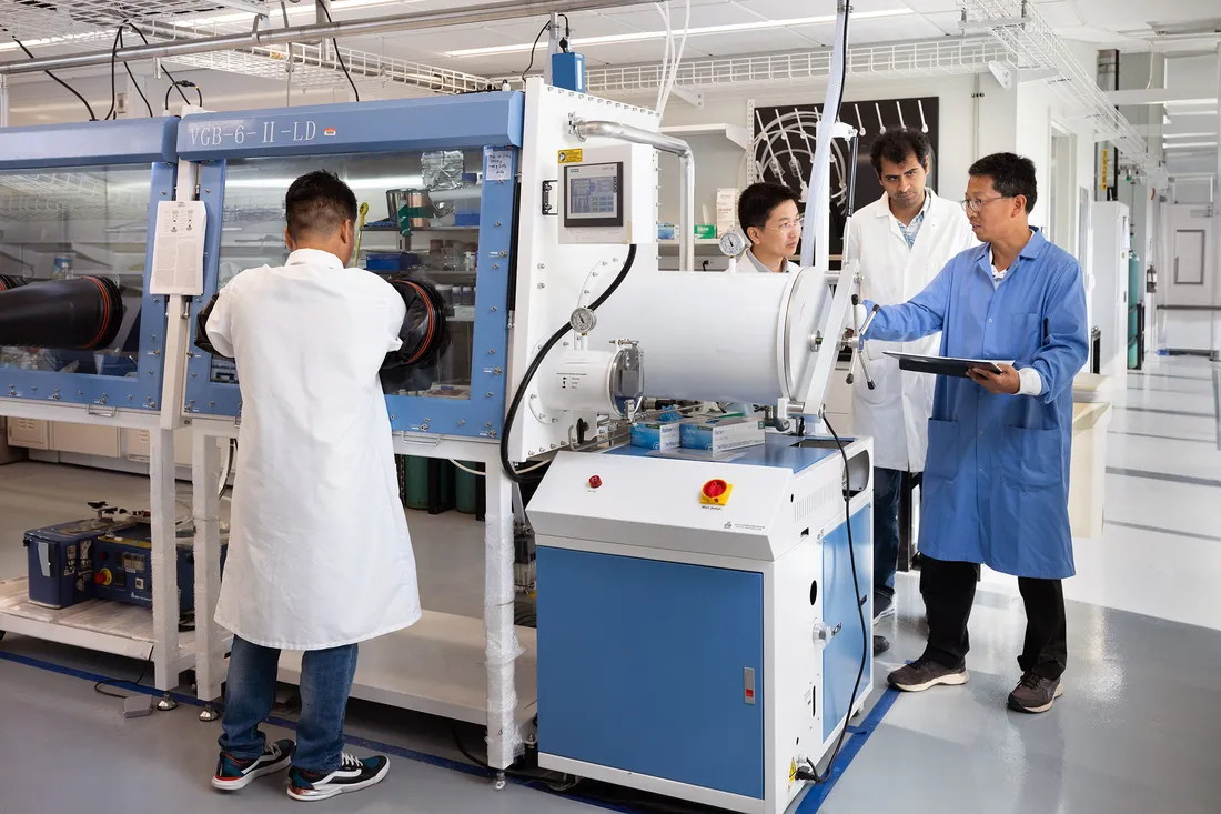 People working on equipment.