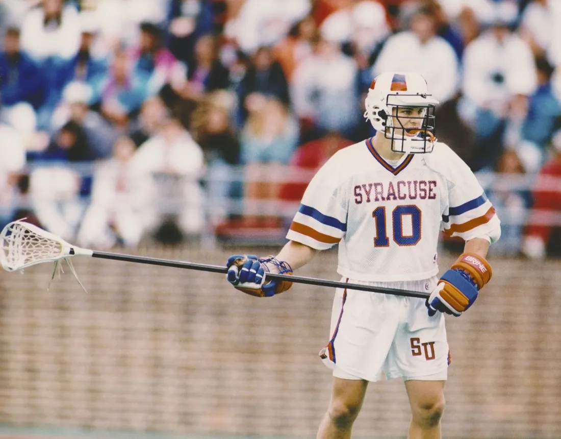 A young Regy Thorpe plays for Syracuse University men's lacrosse.