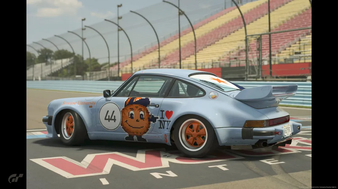 A video game car with a Syracuse University themed design.