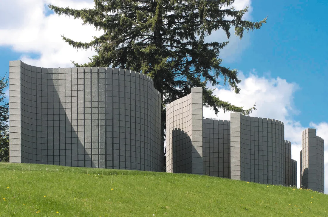 Image of the six curved walls located on Crouse college hill.