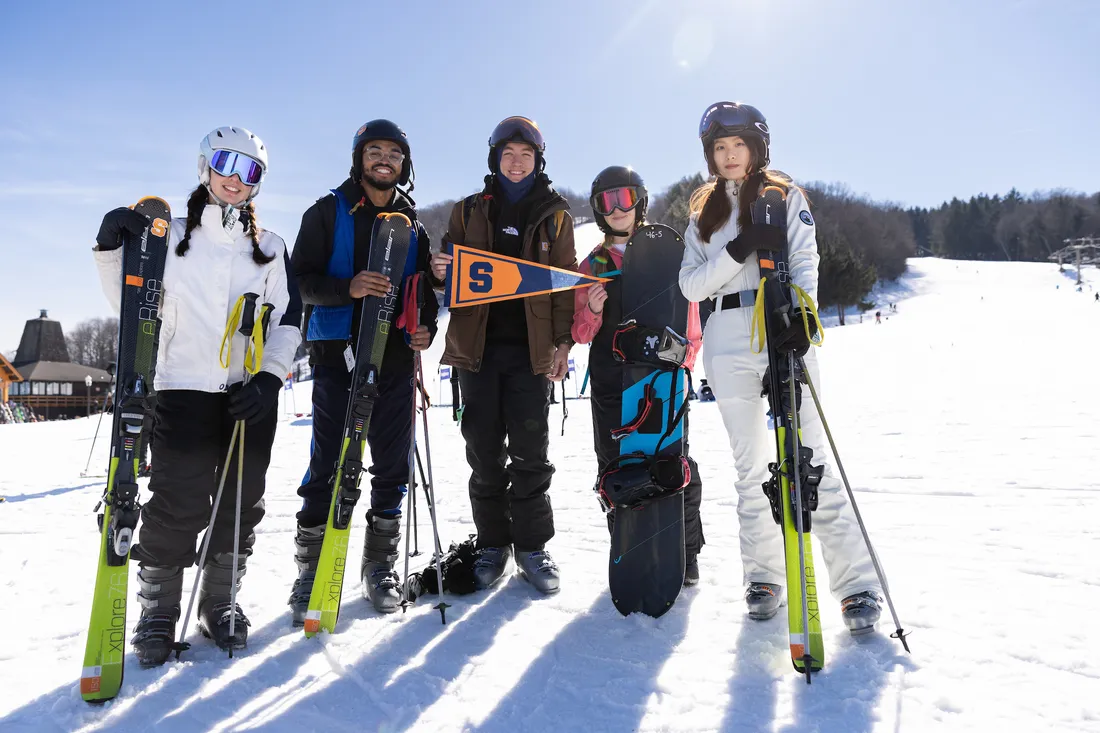 People on a ski slope.