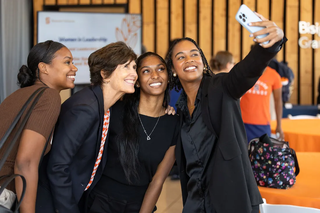 Four women in leadership taking a selfie.
