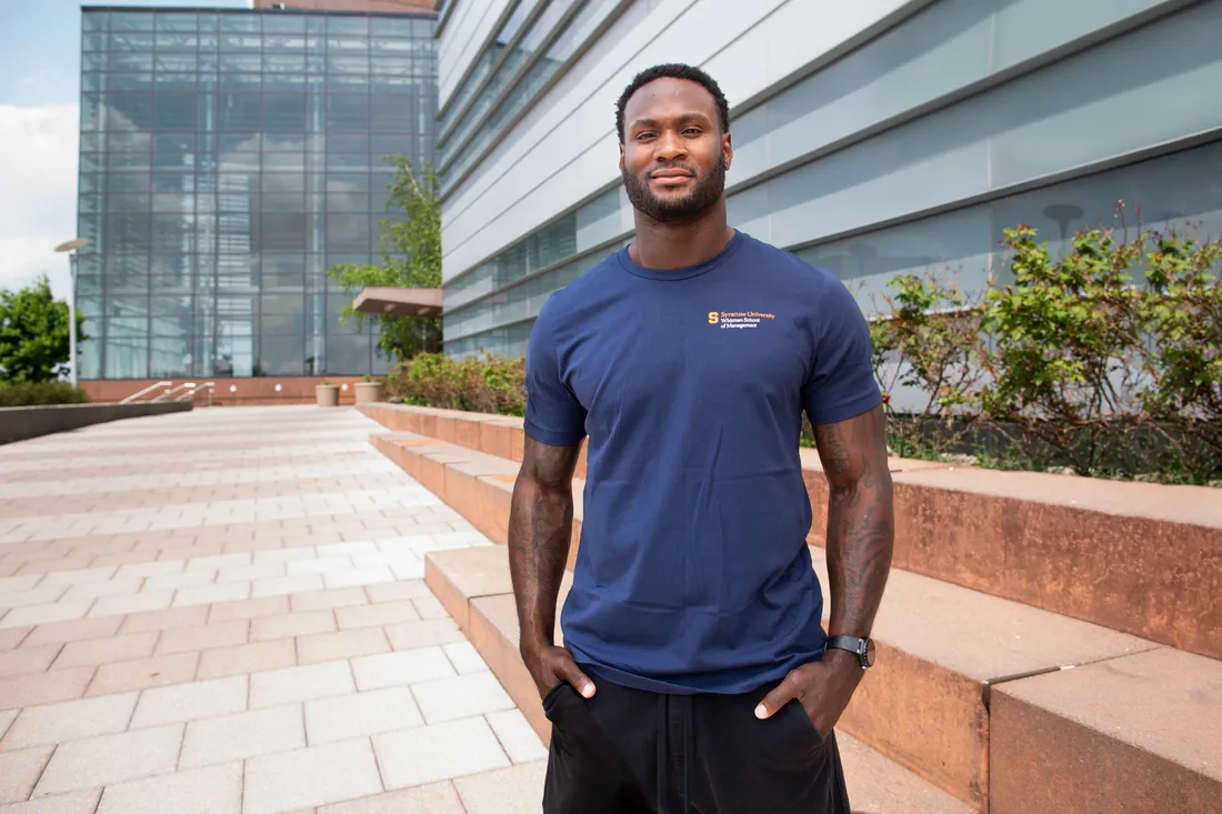 Latavius Murray G’20 posed outside the Martin J. Whitman School of Management building.