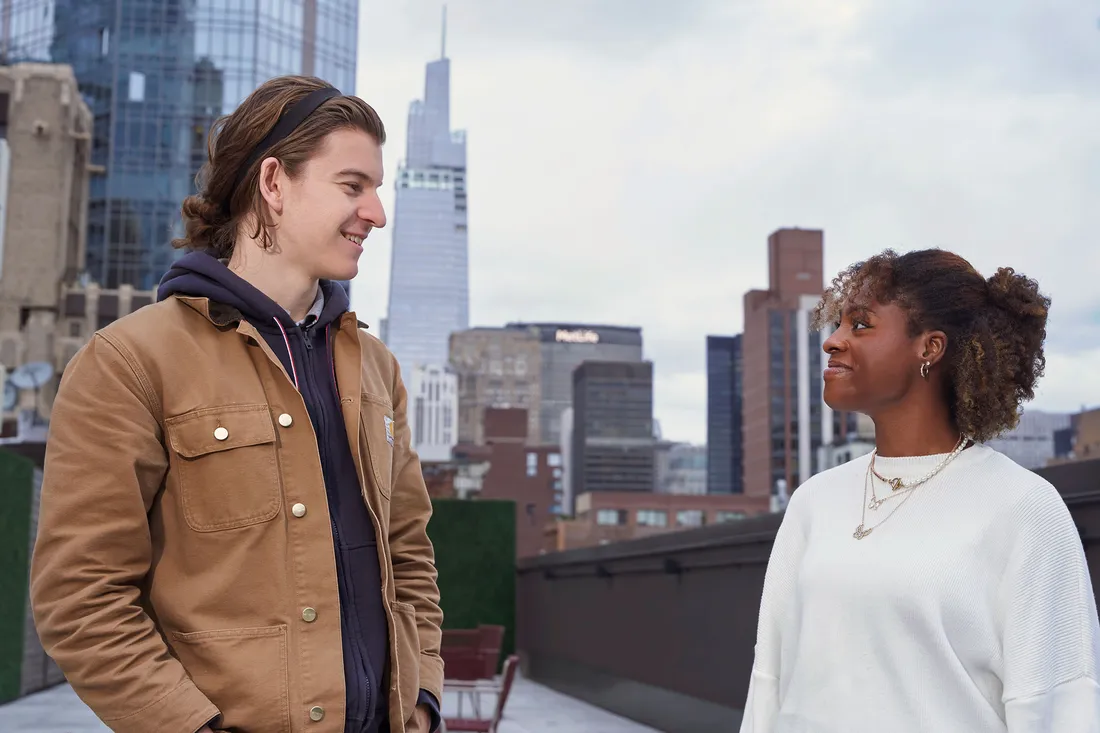 Two students talking in New York City.