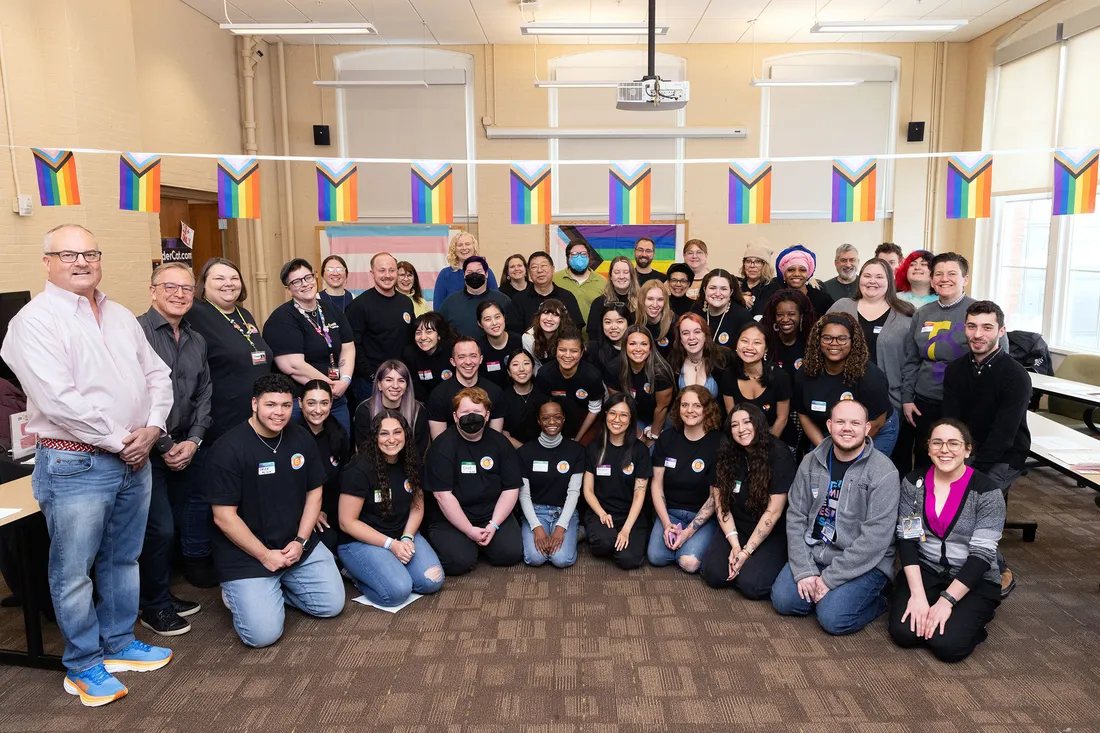 Group of people posing for a photo.