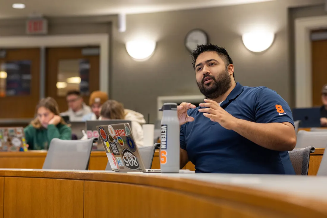 Raul Rosique Jr. speaking in class.