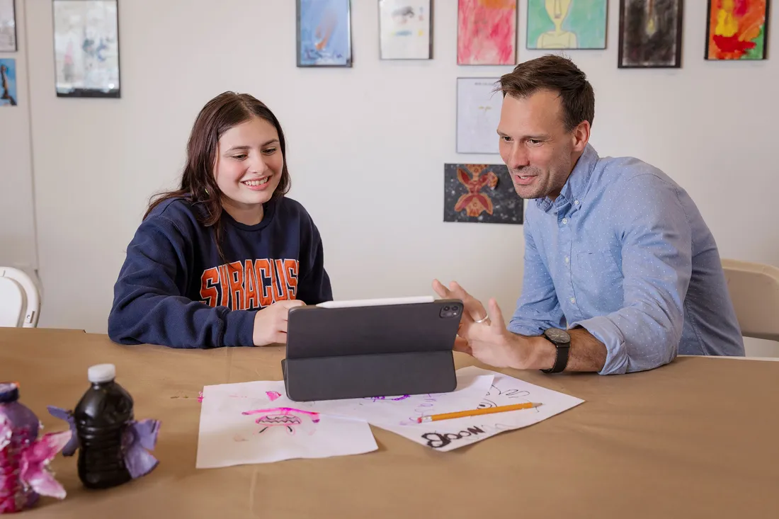 Brice Nordquist working with a student.