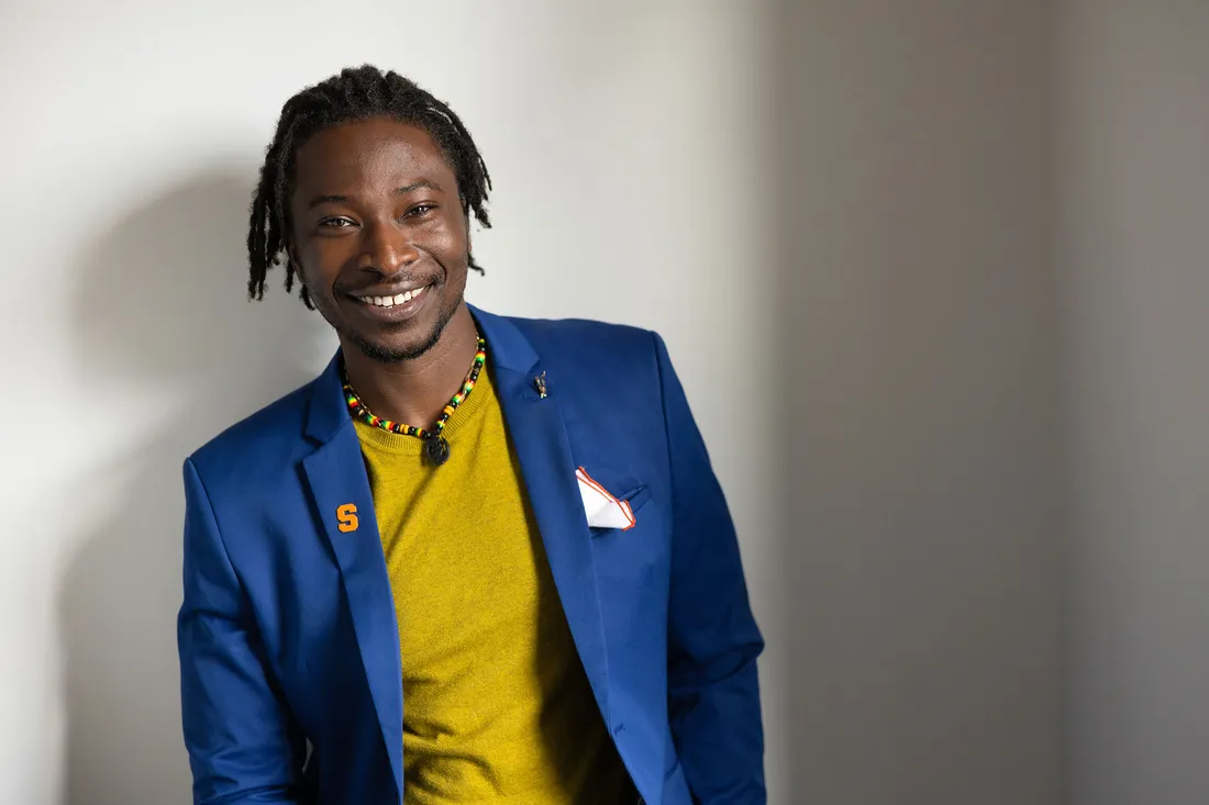 Person posting for headshot.