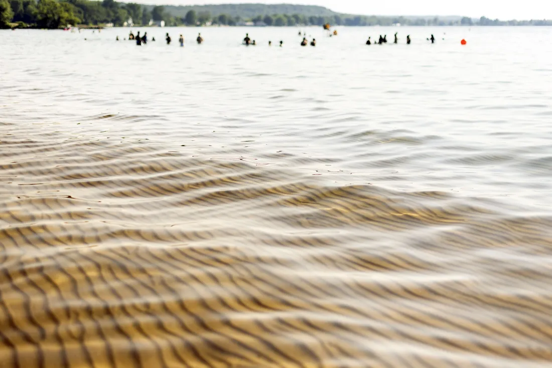 Sand and water at a beach on Lake Ontario.