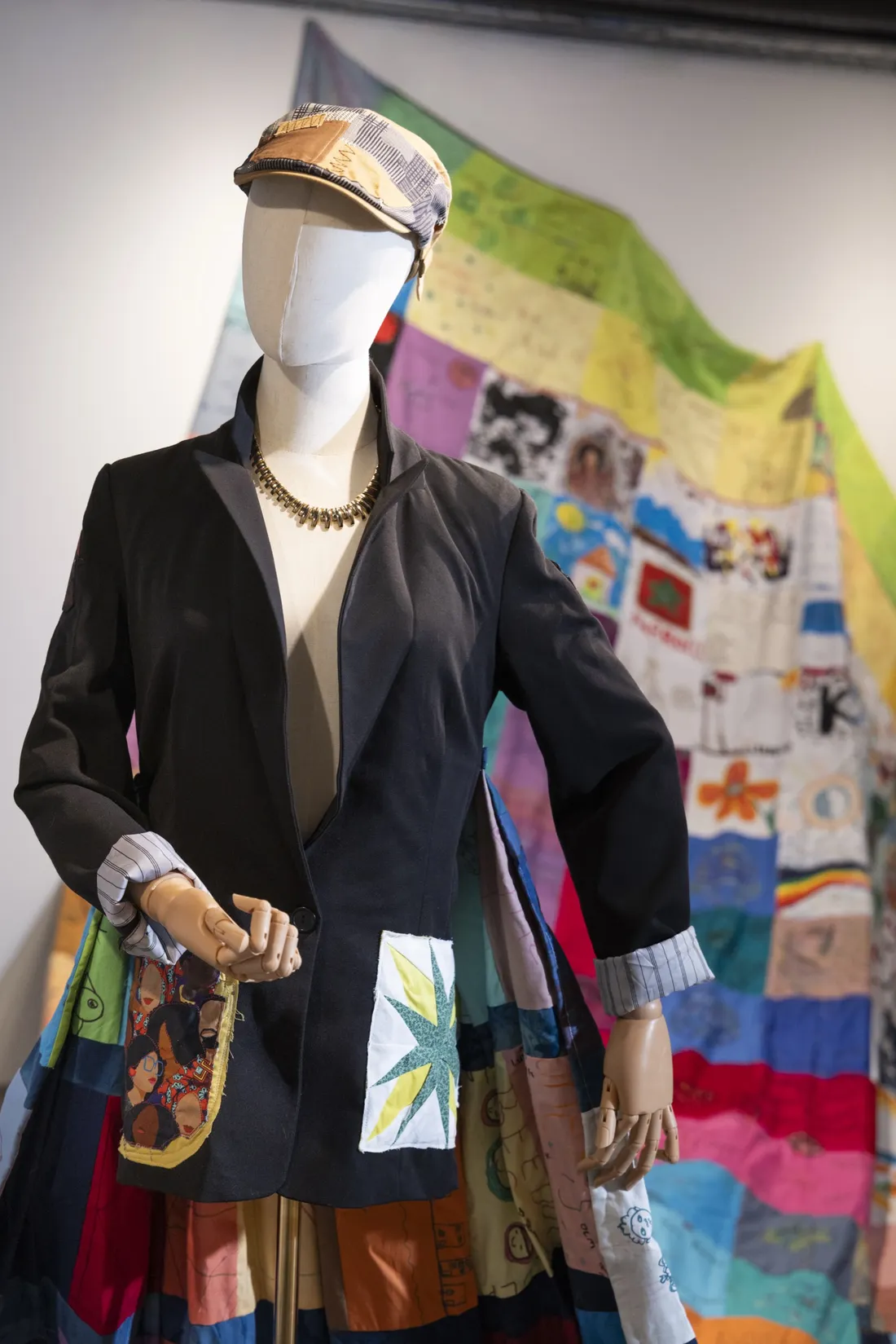 A mannequin wearing a jacket as part of an art project.