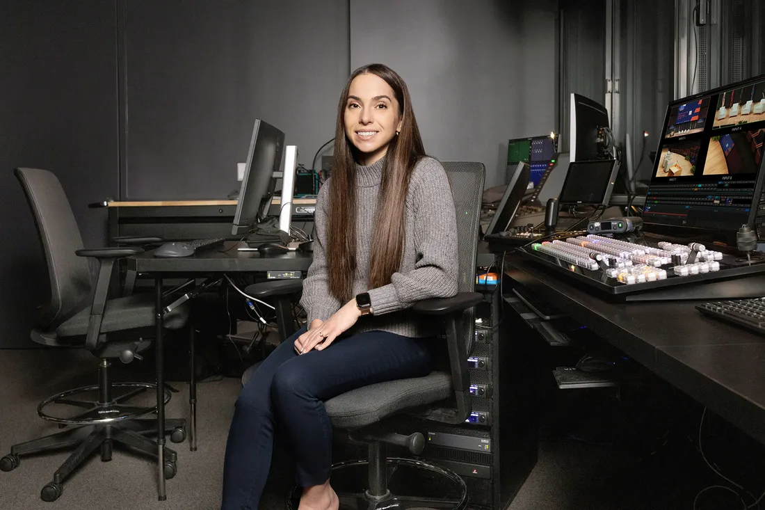 Gianna Mangicaro sitting in a chair.