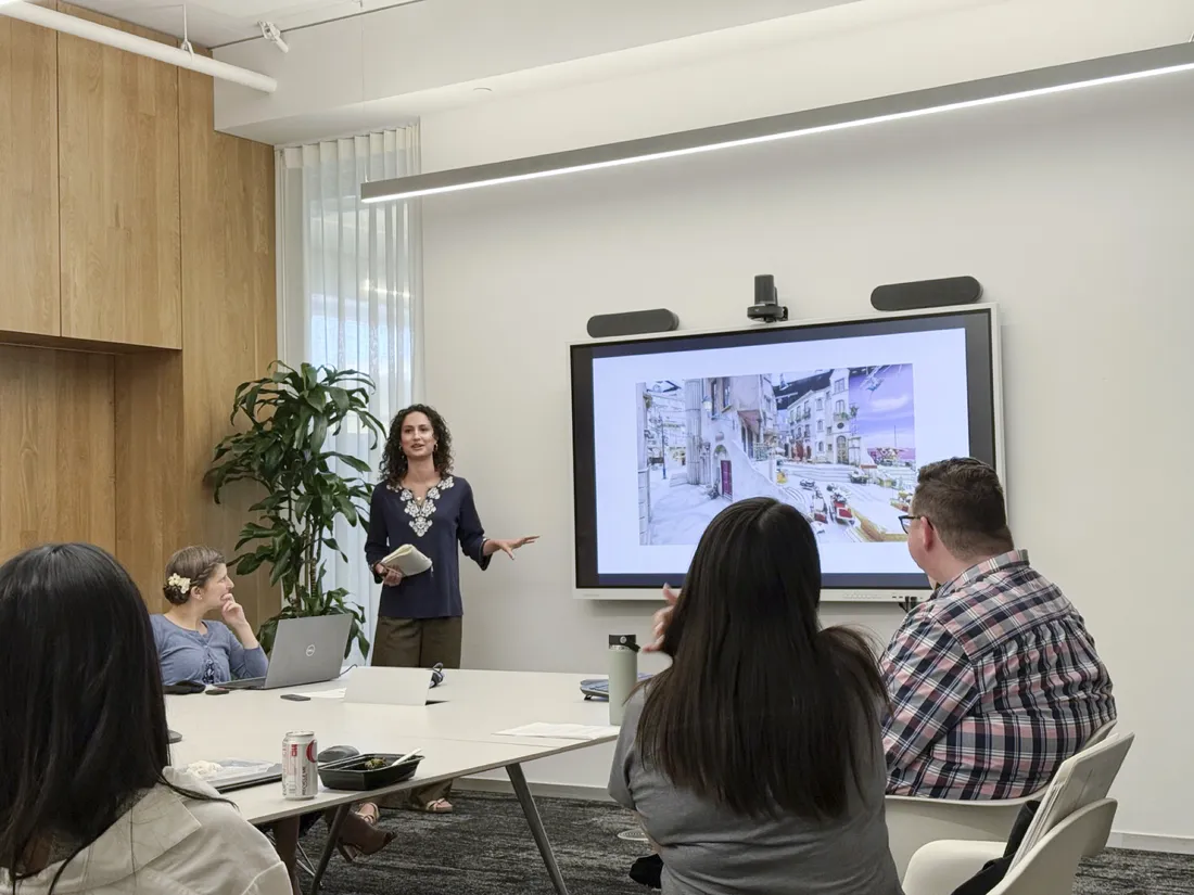 Martha Casey '27 giving a presentation at her internship.