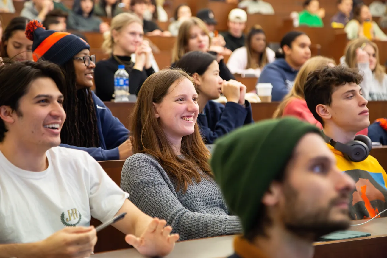 Students sitting in a lecture hall.