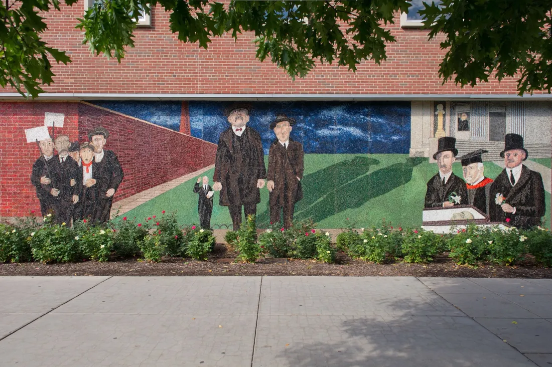 Image of the Sacco and Vendezzit mural located on the Syracuse quad.