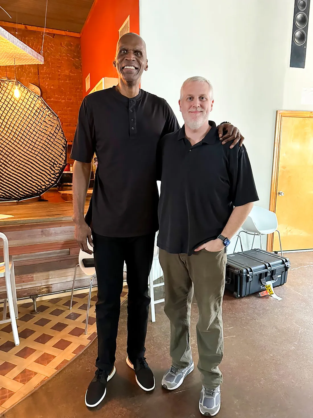 Gabe Honig standing with Robert Parish during the filming of Celtics City.
